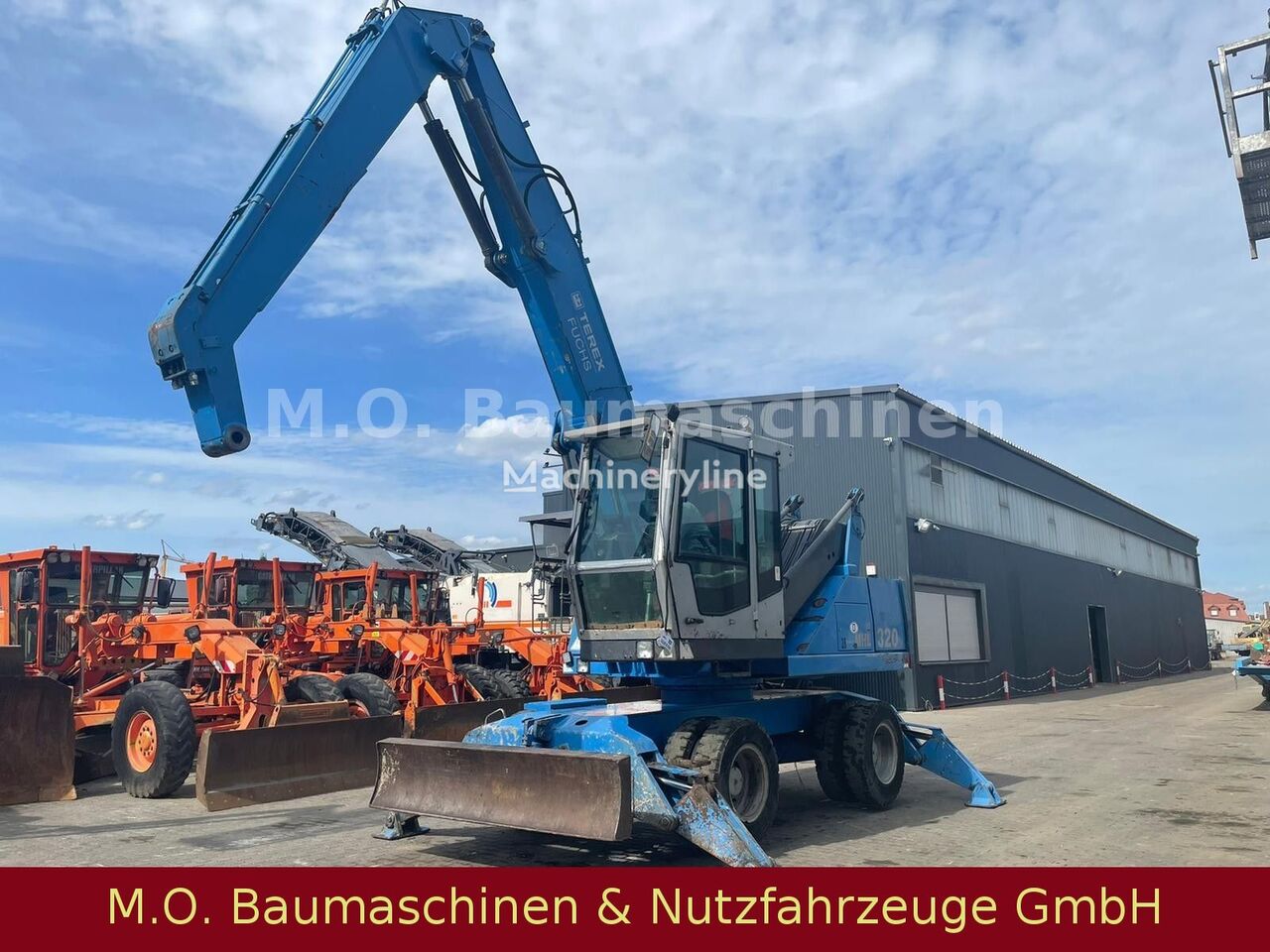 Fuchs MHL 320 ZSA  material handler